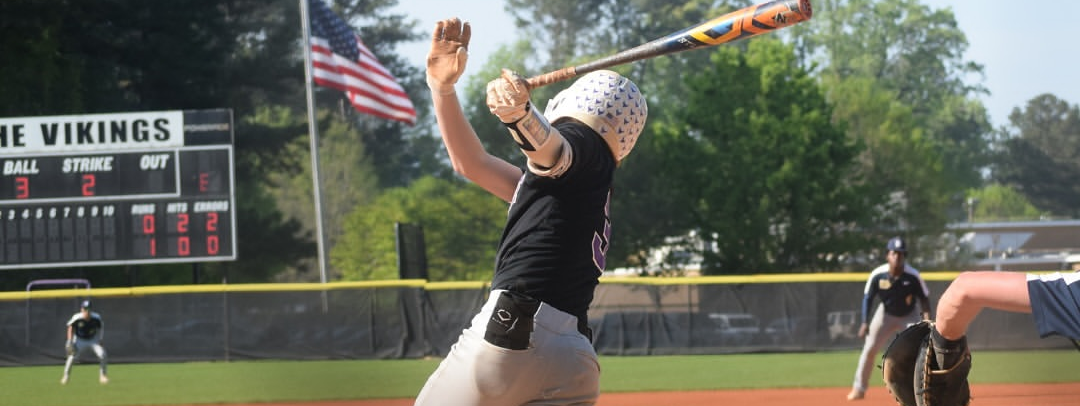 Lakeside Viking Baseball athlete finishing his swing at the plate